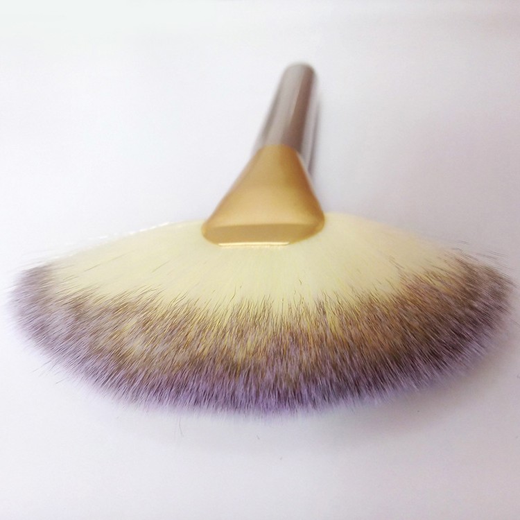 fan makeup brush